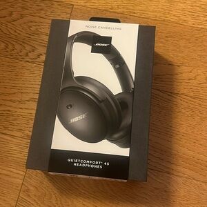 BRAND NEW- never opened, black Bose noise canceling headphones